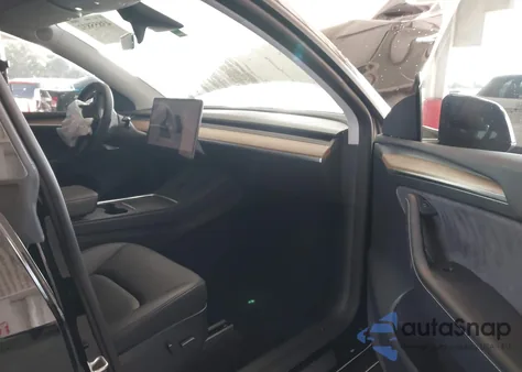 2023 Tesla Model Y Awd/Long Range Dual Motor All-Wheel Drive z USA, uszkodzony, nr VIN 7SAYGDEE0PA086951